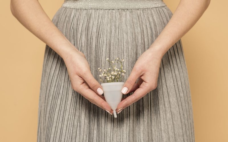 close-up-plastic-cup-with-flowers
